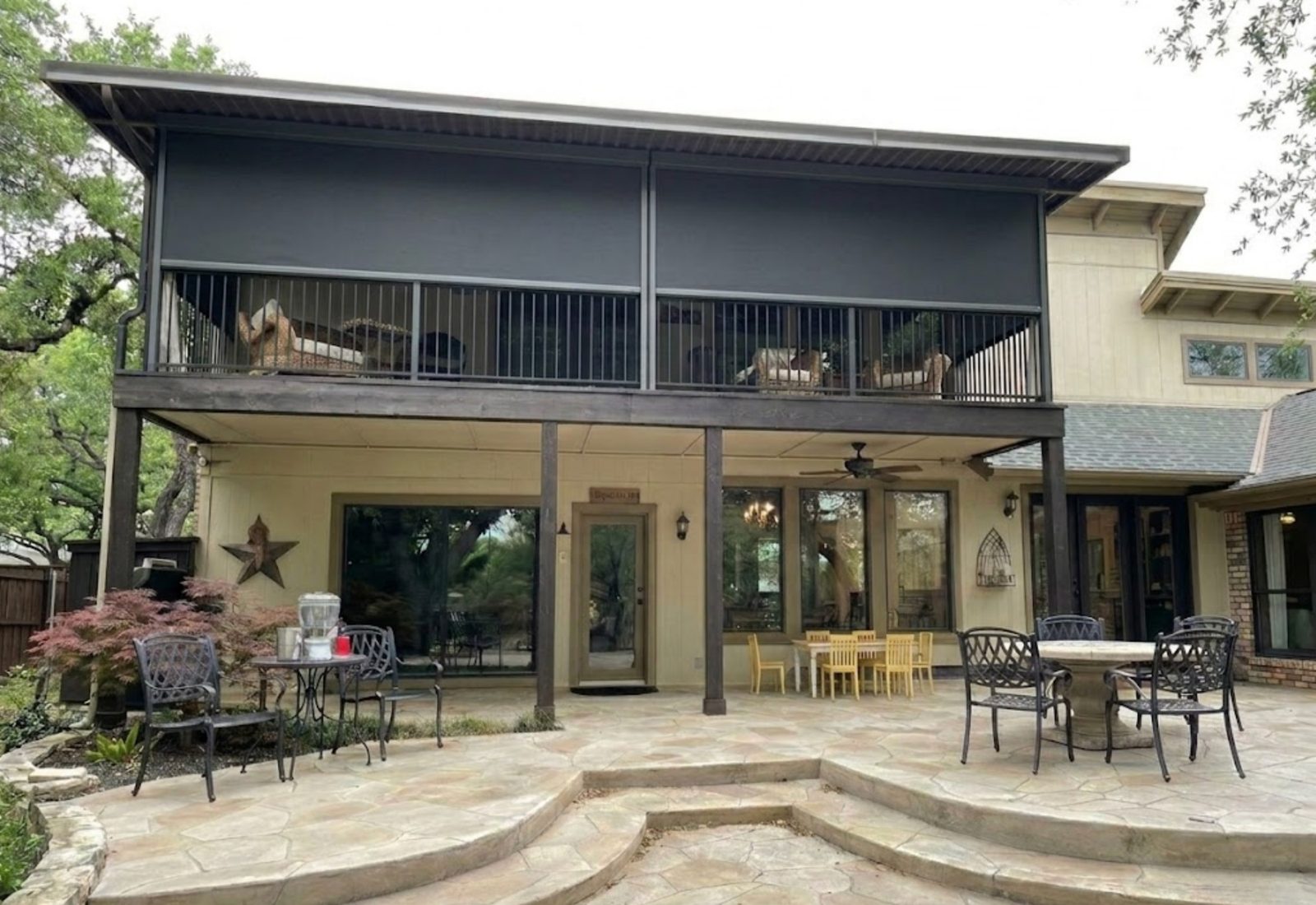 Motorized patio shades deployed on two-story home in Colleyville, Texas